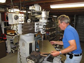 IMG_2900 2010-08-16 - drilling holes for the new ashpan before cutting and bending operations.