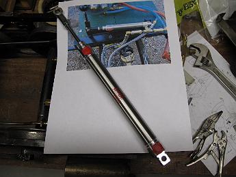 IMG_2902 2010-08-25 - Taking a page from Greg Glos at Mid-South Live Steamers, I pick up a stainless steel air cylinder to use as a hand pump.