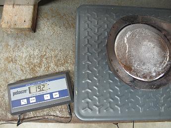 IMG_5114 27-Aug-2013 Weighing the casting filled with lead - 19.2 pounds. The cast iron dome itself weight about 10 pounds, meaning I only poured 9 pounds of lead. I am surprised, I thought it would be much heavier.