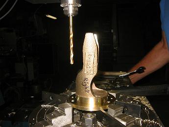 MikadoValveCovers18Sept6 005 18-Sept-06 With the finished small Jacobs drill chuck held in the mill, we proceed to drill the rear valve cover holes.